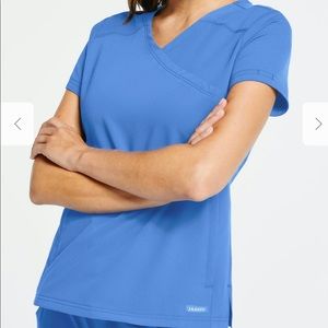 Jaanuu Women's 3 Pocket Mock Top Scrub in Ceil Blue Color Size M